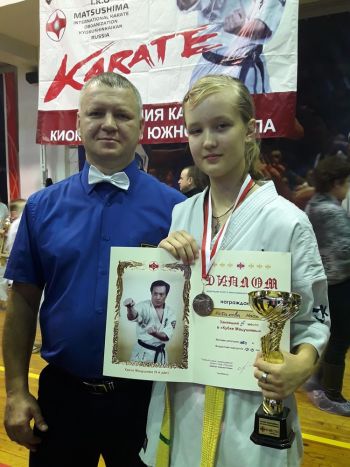 Анастасия Кабакова с тренером Евгением Боженко
